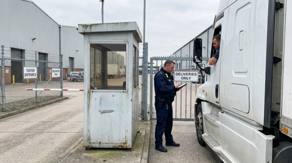 Warehouse gate controlling by a security guard.
